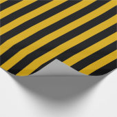 Vertikales Gold und schwarze Streifen Geschenkpapier (Ecke)