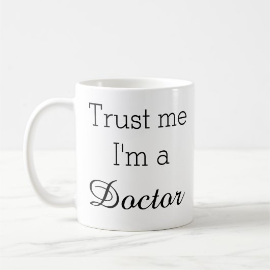 Vertrauen Sie, dass ich ich ein Doktor Mug bin Kaffeetasse (Links)