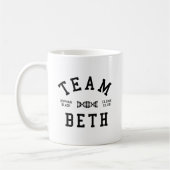 Verwaistes schwarzes Team Beth Kaffeetasse (Links)