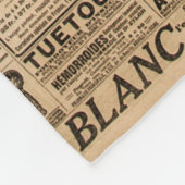 Verwendeter Papierhintergrund. Alte Zeitungsseite  Fleecedecke (Ecke)