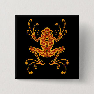 Verwickelter roter und gelber Baum-Frosch Button