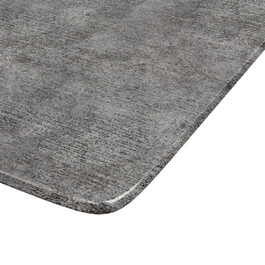 Verwitterter grauer Zement-Bürgersteig Schneidebrett (Ecke)