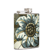 Verzierte Blumenmedaille über hellblauen Hintergru Flachmann (Rechts)