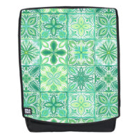 Verzierte grüne und weiße Fliesen