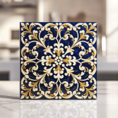 Verziertes Blau und Gold-Scrollwork Fliese