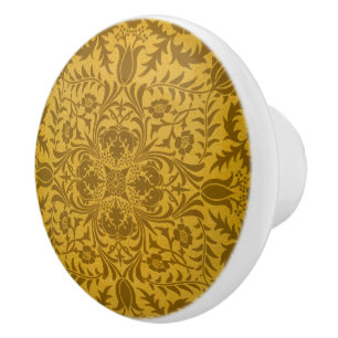 Verziertes goldenes Blumenmuster mit symmetrischen Keramikknauf