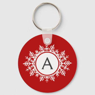 Verziertes White Snowflake Monogramm auf festliche Schlüsselanhänger