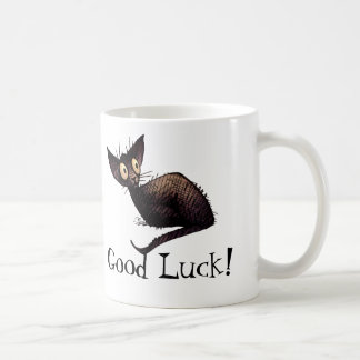 Viel Glück-lustige glückliche schwarze Kaffeetasse