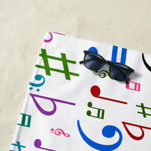 Viele farbenfrohe Musiknoten und Symbole Strandtuc Strandtuch (Beispiel)