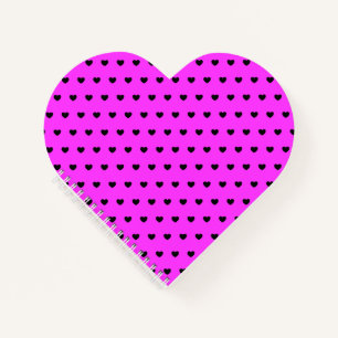 Viele kleine schwarz-rosa-herz-förmige Notebooks Notizblock