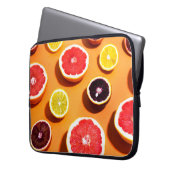 Viele verschiedene Zitrusfrüchte Muster im Sonnenl Laptopschutzhülle (Vorderseite Links)