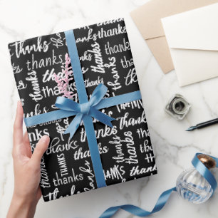 Vielen Dank Text auf Schwarz Geschenkpapier
