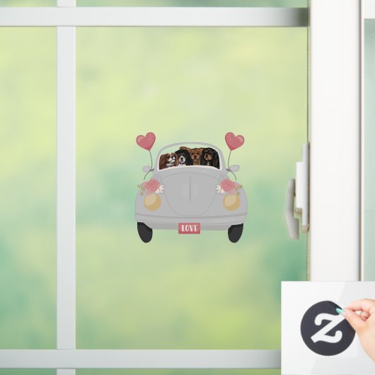 Vier Cavalier-Spaniels im Auto mit Herz Fensteraufkleber (Zuhause)