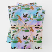Vier Cavalier-Spaniels in einem Bereich von Blume Geschenkpapier Set (Beispiel)