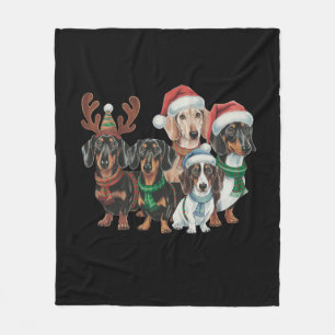 Vier Dackeln Hunde mit festlicher Kleidung Fleecedecke