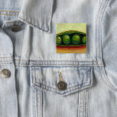 Vier Erbsen in einer einzigartigen ursprünglichen Button (Beispiel)