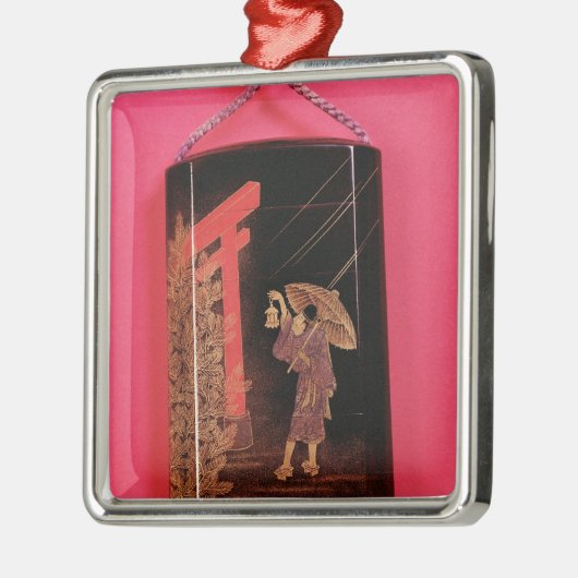 Vier Fall inro, der ein Mannschützen darstellt Silbernes Ornament (Links)