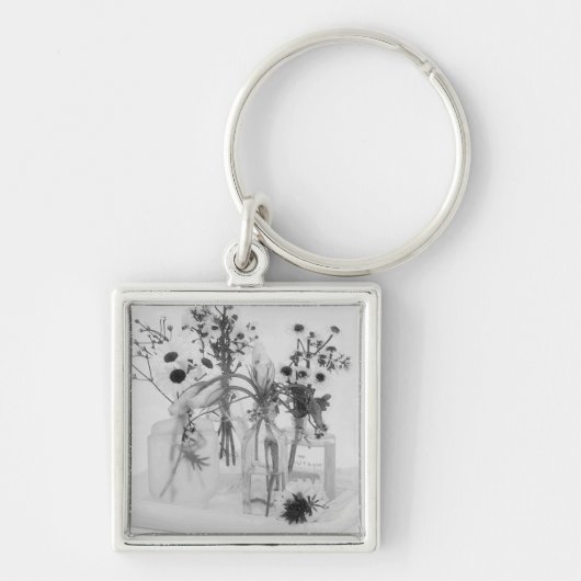 Vier Flaschen und weiße Blume Schlüsselanhänger (Vorne)