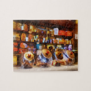 Vier Glasbonbonschalen Puzzle