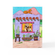 Vier Katzen in einem Lila Adobe House