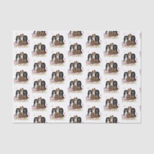 Vier Kavalier King Charles Spaniels in Blume Seidenpapier