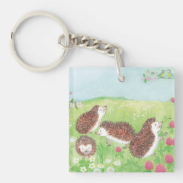 Vier kleine Igel auf der blühenden Wiese Schlüsselanhänger