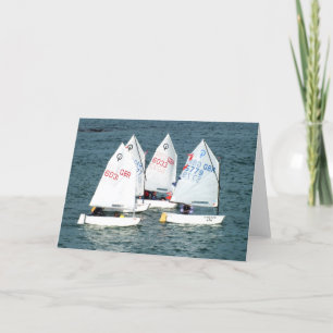 Vier Optimist-Segelboote Feiertagskarte