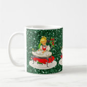 Viktorianisches Weihnachtsmädchen schreibt grüner  Kaffeetasse (Links)