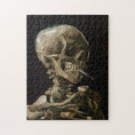 Vincent van Gogh Art Puzzle<br><div class="desc">Vincent van Gogh (Niederländisch, 1853 - 1890) Schädel eines Skeletts mit brennender Zigarette, 1885-86, Öl auf Leinwand Ungerahmt: 32 cm × 24, 5 cm (13 in × 9, 6 in) Früharbeit von Vincent van Gogh. Dieses kleine Gemälde ist Teil der ständigen Sammlung des Van Gogh Museums in Amsterdam. Es wurde...</div>