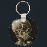 Vincent van Gogh Art Schlüsselanhänger<br><div class="desc">Vincent van Gogh (Niederländisch, 1853 - 1890) Schädel eines Skeletts mit brennender Zigarette, 1885-86, Öl auf Leinwand Ungerahmt: 32 cm × 24, 5 cm (13 in × 9, 6 in) Früharbeit von Vincent van Gogh. Dieses kleine Gemälde ist Teil der ständigen Sammlung des Van Gogh Museums in Amsterdam. Es wurde...</div>