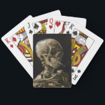 Vincent van Gogh Art Spielkarten<br><div class="desc">Vincent van Gogh (Niederländisch, 1853 - 1890) Schädel eines Skeletts mit brennender Zigarette, 1885-86, Öl auf Leinwand Ungerahmt: 32 cm × 24, 5 cm (13 in × 9, 6 in) Früharbeit von Vincent van Gogh. Dieses kleine Gemälde ist Teil der ständigen Sammlung des Van Gogh Museums in Amsterdam. Es wurde...</div>
