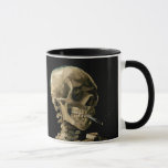 Vincent van Gogh - Skull mit brennender Zigarette Tasse<br><div class="desc">Kopf eines Skeletts mit brennender Zigarette / Schädel mit brennender Zigarette / Kran de squelette fumant une zigarette - Vincent van Gogh,  1885</div>