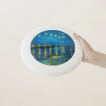 Vincent Van Gogh Starry Night Over the Rhone Wham-O Frisbee<br><div class="desc">Van Gogh Masterpiece Starry Night - Ein Gemälde von Vincent Van Gogh,  Starry Night Over the Rhone,  zeigt eine Nacht voller Sterne und eine Brücke. In Arles France in der Nacht gemalt,  1888 gemalt.</div>