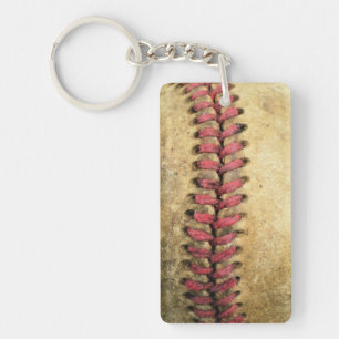 Vintage-Baseball-Kunst - gealtertes Leder und rote Schlüsselanhänger