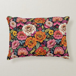 Vintage-Blumenmuster mit kräftigen Farben auf Schw Dekokissen