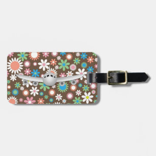 Vintage braune Blütendecke mit Flugzeug Gepäckanhänger