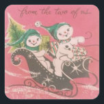Vintage Christmas Snowman Couple Quadratischer Aufkleber<br><div class="desc">Rosa Niedlich Retro Vintage Weihnachten Snowman Couple Riding in Sleigh Bringing Geschenke Holiday Square Sticker.</div>