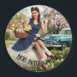 Vintage Easter Pin-Up Clock | Retro Girl Art Große Wanduhr<br><div class="desc">Add a timeless touch of 1950s nostalgia to your home with this unique artistic wall clock. This design features a minimalist face without numbers, allowing the vibrant pin-up illustration to shine as a decorative panel. A charming girl in a polka-dot dress sits on a massive decorated Easter egg, surrounded by...</div>
