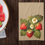 Vintage Erdbeeren Nr. 2 Geschirrtuch<br><div class="desc">Vintages Erdbeeren Küchentuch .Grafische Abbildung mit einigen reifen Erdbeeren mit grünen Blätter und weißen Blume . Es hat ein schönes Frühsommer-Gefühl. Nr. 2 mit Kraft-Hintergrund .(#C1A178 ) ______________ von Alma Wad und Canva AI erstellt . ___________ Toll für ein Sommerpicknick ,  Garten-Party , fête champêtre .</div>