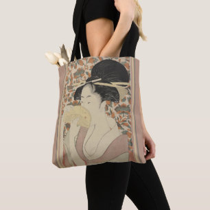 Vintage Frau, die einen Tortoise-Muschel-Komb hält Tasche