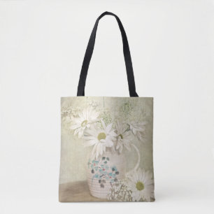 Vintage-Gänseblümchenstrauß in alter Kanne Tasche