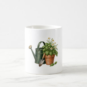 Vintage grüne Gießkanne und Kamillengarten Kaffeetasse