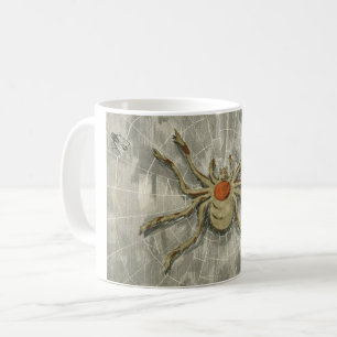 Vintage-Halloween-Spinne in ihrem Netz mit einer F Kaffeetasse