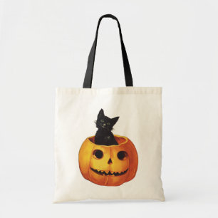 Vintage Halloween, süße schwarze Katze in einem Kü Tragetasche
