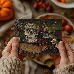 Vintage Halloween-Szene Decoupage Skull Ephemera Postkarte<br><div class="desc">Dieses Design kann durch Auswahl der Option Design bearbeiten personalisiert werden. Sie können auch auf andere Gegenstände übertragen. Kontaktieren Sie mich unter colorflowcreations@gmail.com oder nutzen Sie die Chat-Option oben auf der Seite, wenn Sie dieses Design auf einem anderen Produkt haben möchten oder Hilfe bei diesem Design benötigen. Sehen Sie mehr...</div>