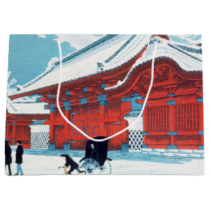 Vintage japanisches rotes Tor in winterlichem Schn Große Geschenktüte