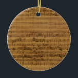 Vintage Noten von Johann Sebastian Bach Keramik Ornament<br><div class="desc">Vintages Illustrationsmusikalisches Design mit Notenblatt Cantata 112 Manuskript,  1731 von Johann Sebastian Bach (1685-1750). Eine Kantate ist eine stimmliche Komposition mit instrumentaler Begleitung,  meist in mehreren Bewegungen,  oft mit einem Chor. Antike klassische Noten mit Symbolen inklusive einem dreieckigen Klettstück.</div>