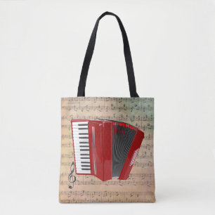 Vintage Notenblätter mit einem roten Akkordeon Tasche