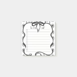 Vintage-Notizblock mit schwarzer Schleife und Chec Post-it Klebezettel