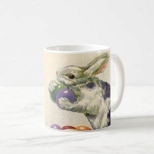 Vintage-Osterhase mit Ostereiern in einem Korb Kaffeetasse